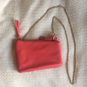 Salmon colored cross body bag